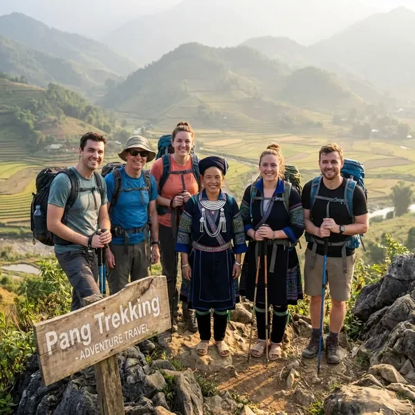 Trekking group with local guide at mountain viewpoint